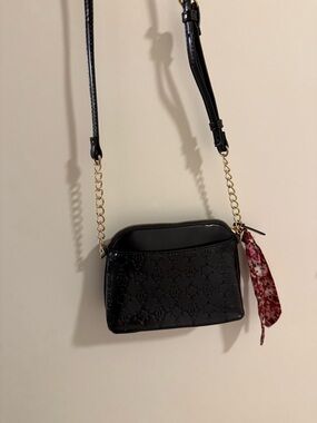 Women's Black Crossbody Bag with Floral Scarf Accent